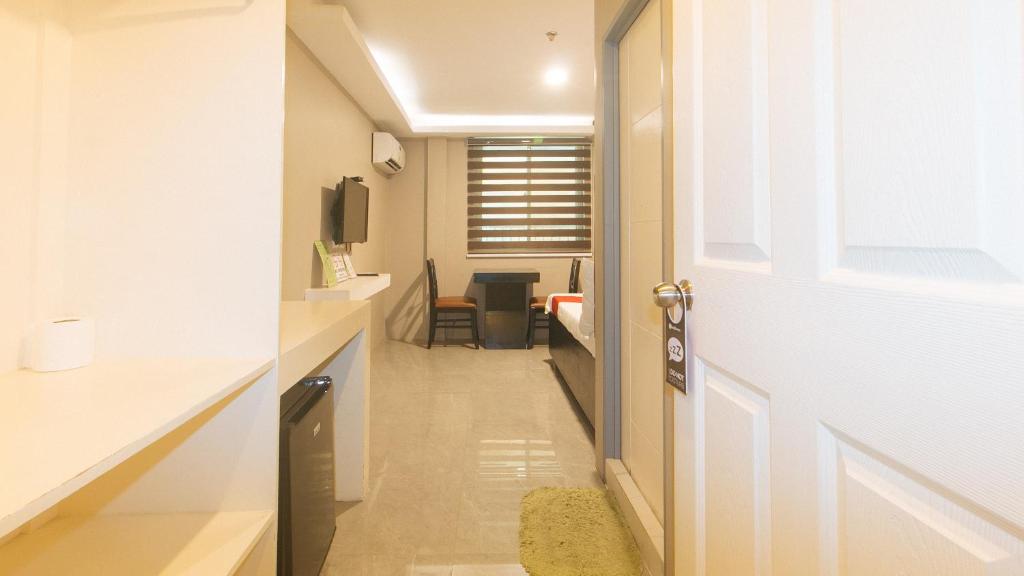 Fotografie z fotogalerie ubytování RedDoorz Plus at Seventy Five Inn Near Manila Airport v destinaci Manila