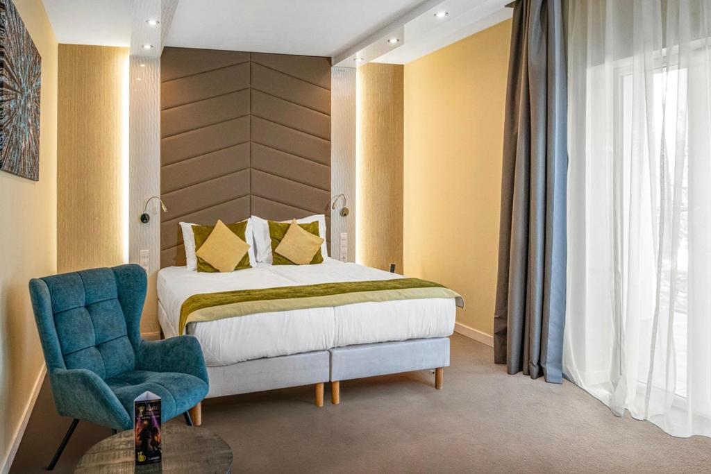 Łóżko lub łóżka w pokoju w obiekcie Hotel Ózon & Luxury Villas