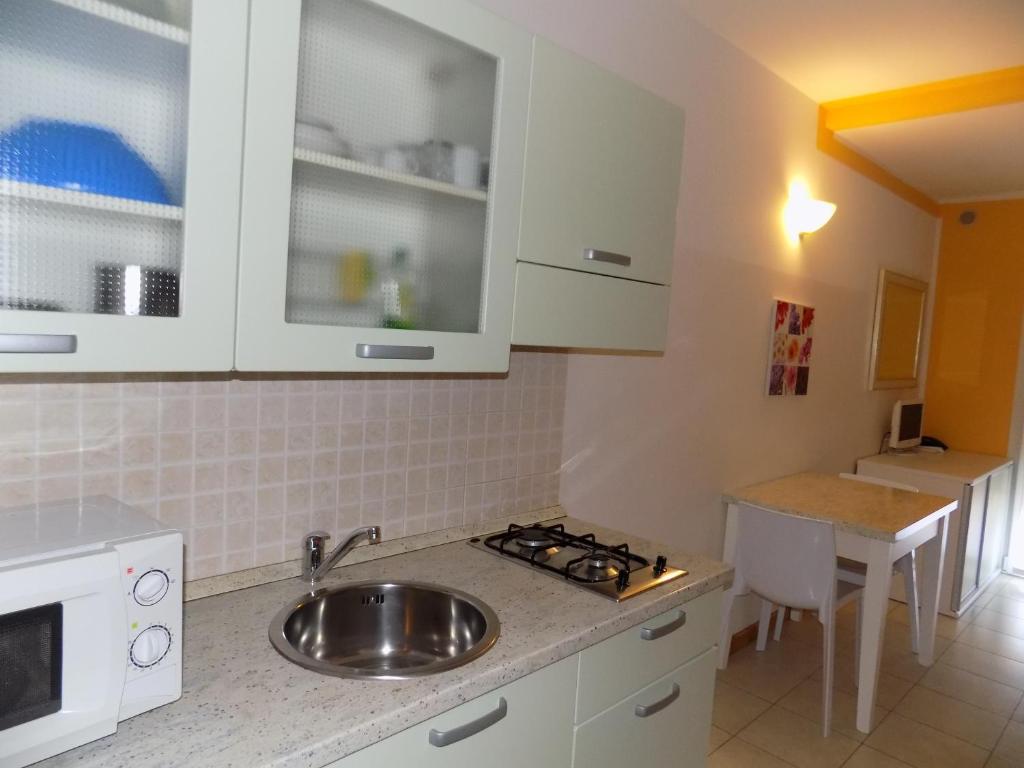 Kuchyň nebo kuchyňský kout v ubytování Hotel Residence Sole