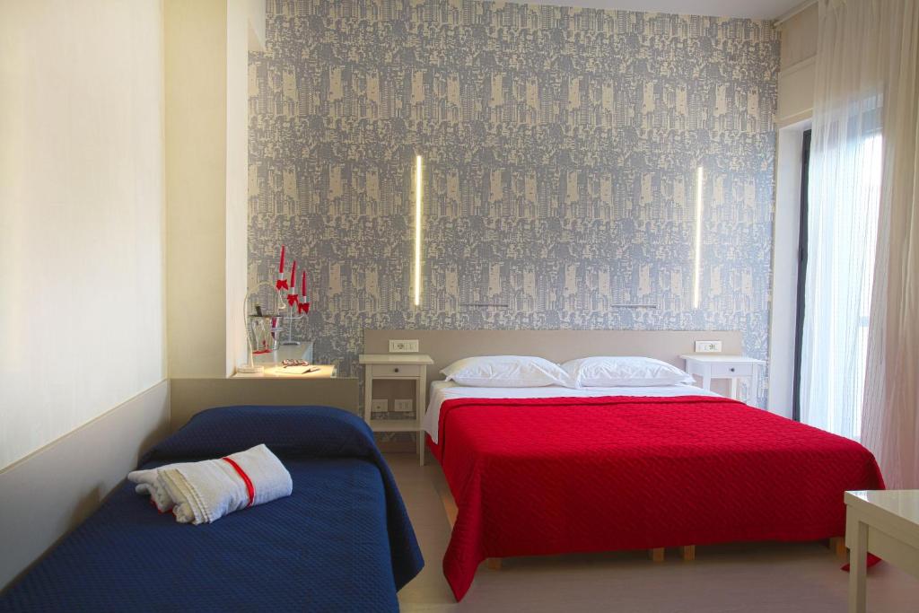 Postel nebo postele na pokoji v ubytování Hotel Kroma