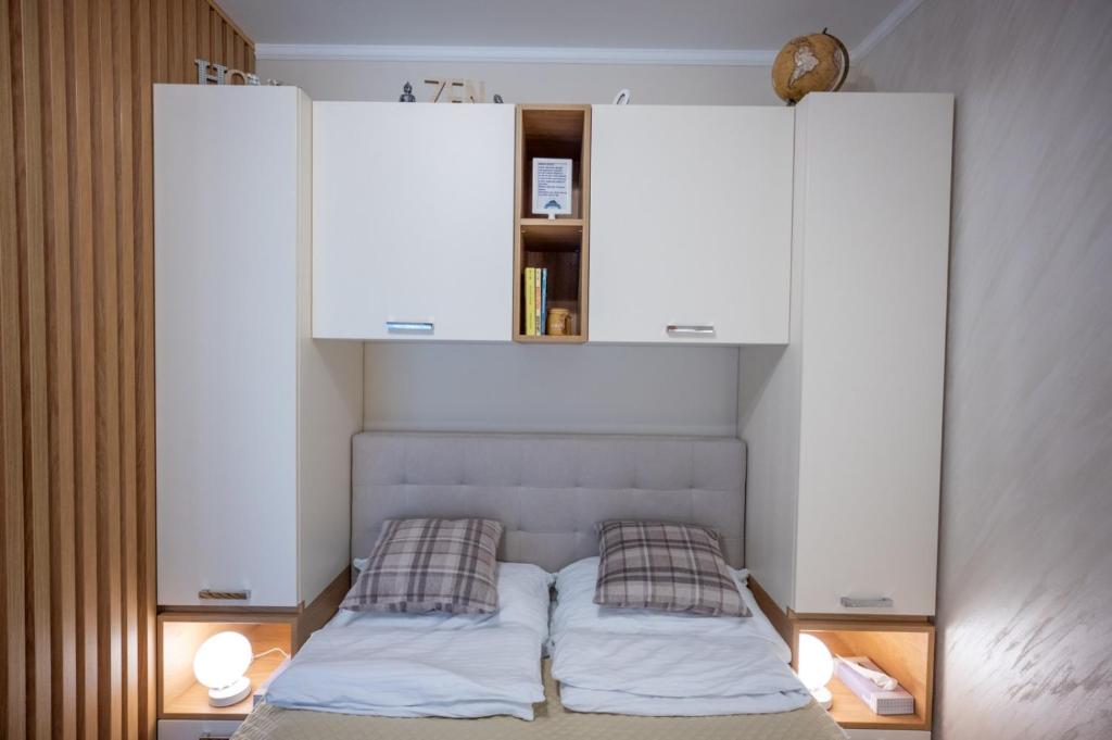 Postel nebo postele na pokoji v ubytování MB APARTMAN TARA
