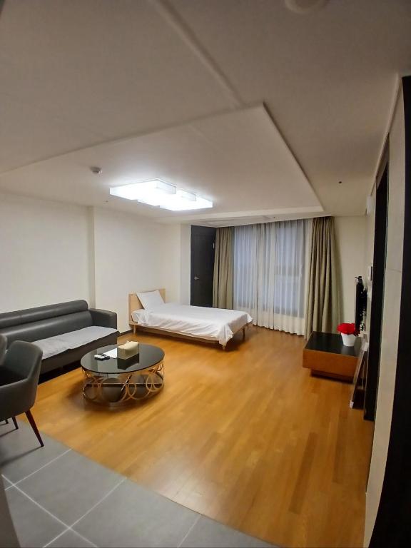 Postel nebo postele na pokoji v ubytování 바다스테이18