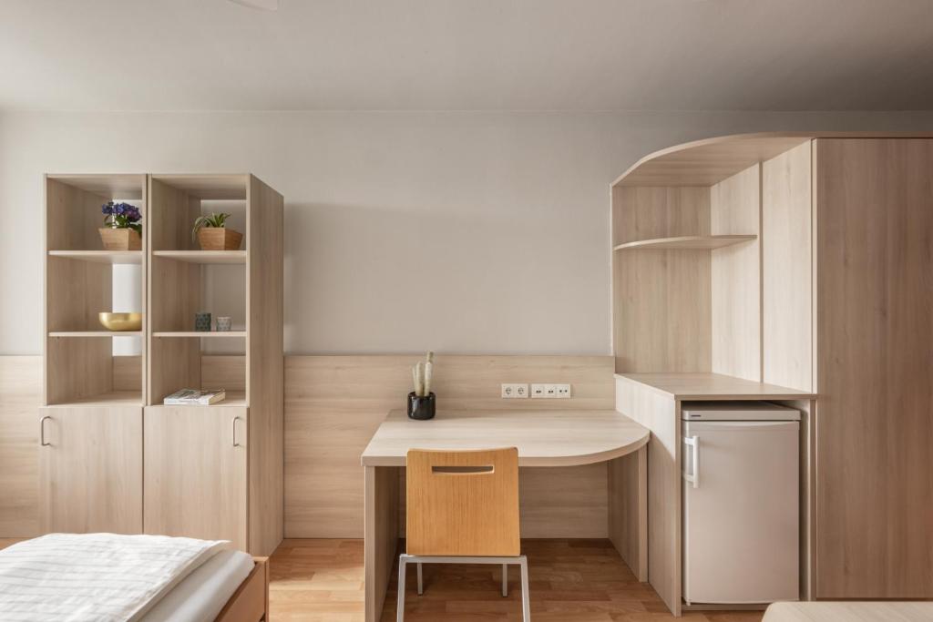 Kuchyňa alebo kuchynka v ubytovaní myNext - Hotel Rudy