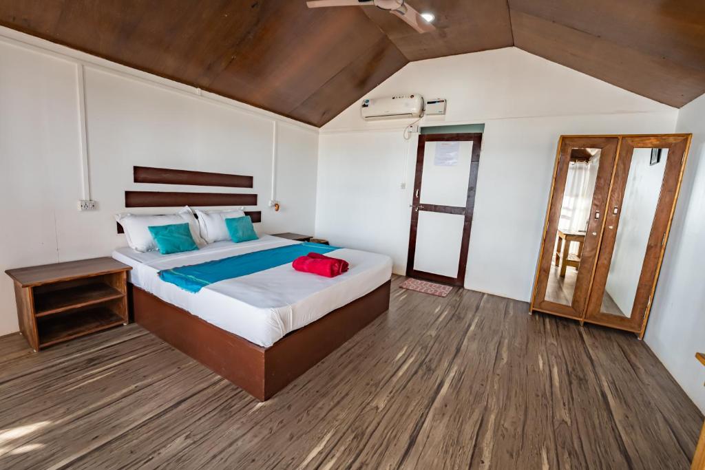 Postel nebo postele na pokoji v ubytování Peace Garden Beach Resort