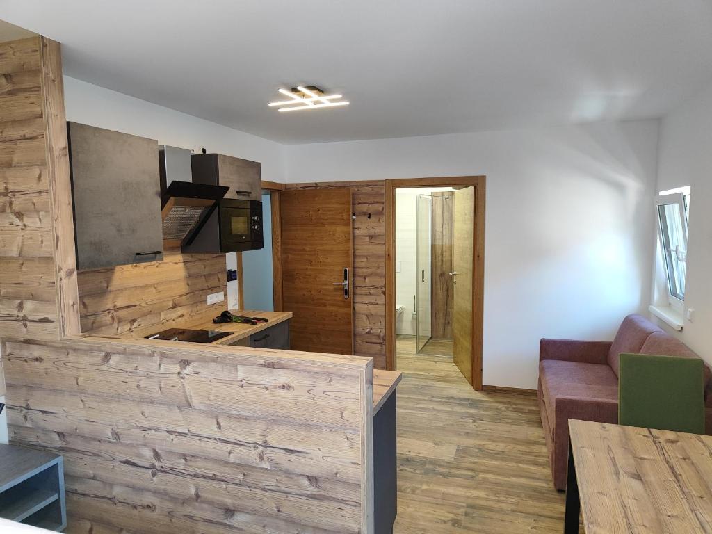 Kuchyň nebo kuchyňský kout v ubytování Hotel-Bad Goisern