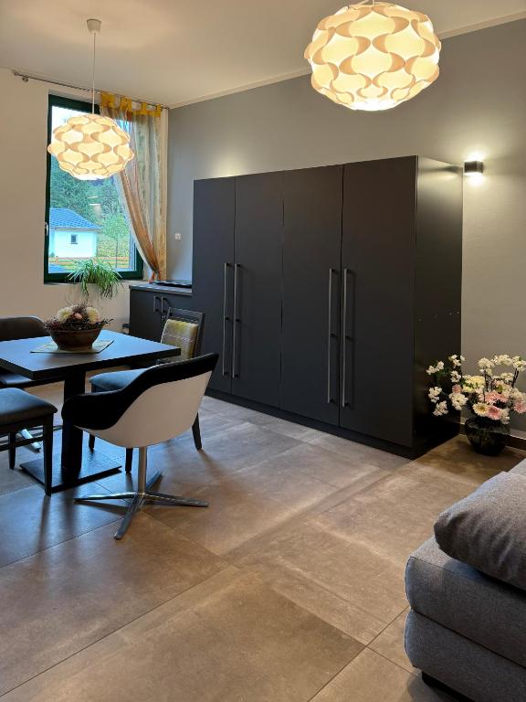 Posezení v ubytování Ferienwohnung Werraquell Hütte