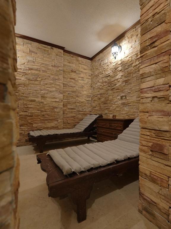 Postel nebo postele na pokoji v ubytování The Castle - Your unique way of retreat