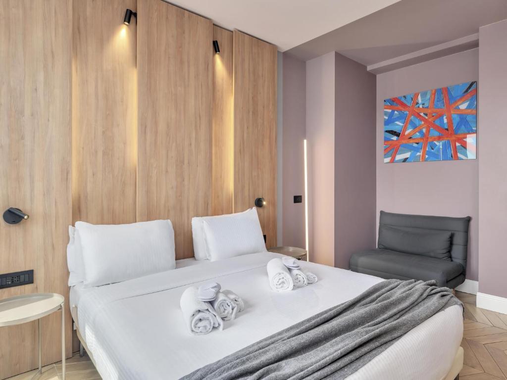 Postel nebo postele na pokoji v ubytování B&B Hotel Milano City Center Duomo