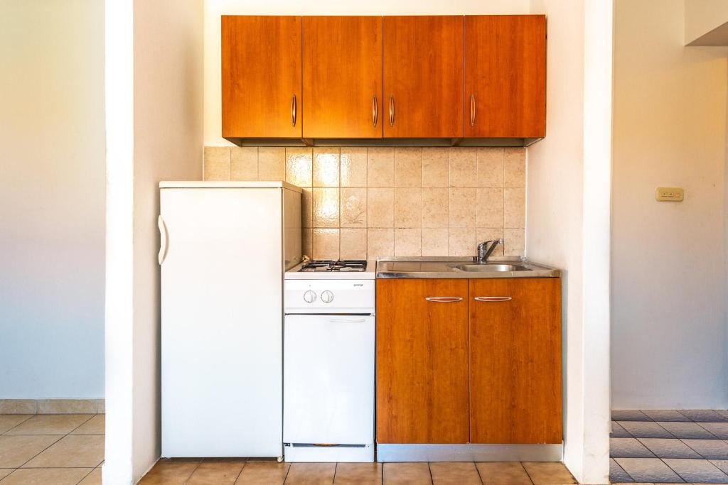 Kuchnia lub aneks kuchenny w obiekcie Apartments Matulo