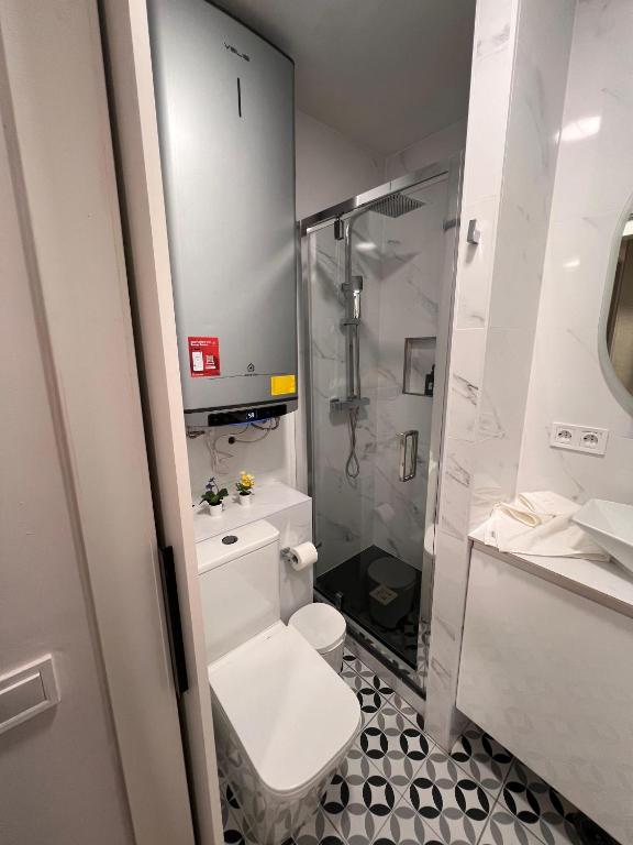 Koupelna v ubytování Room Gran Vía Apartments