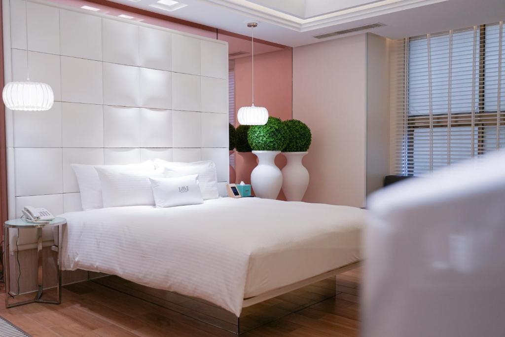 Postel nebo postele na pokoji v ubytování MMMotel