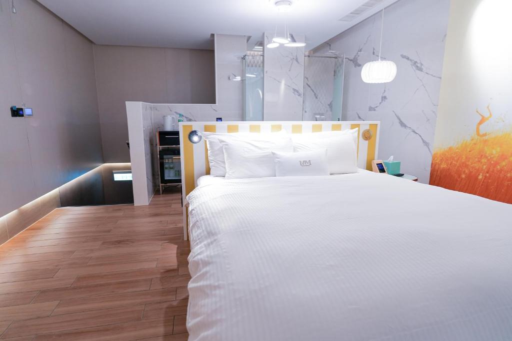Postel nebo postele na pokoji v ubytování MMMotel