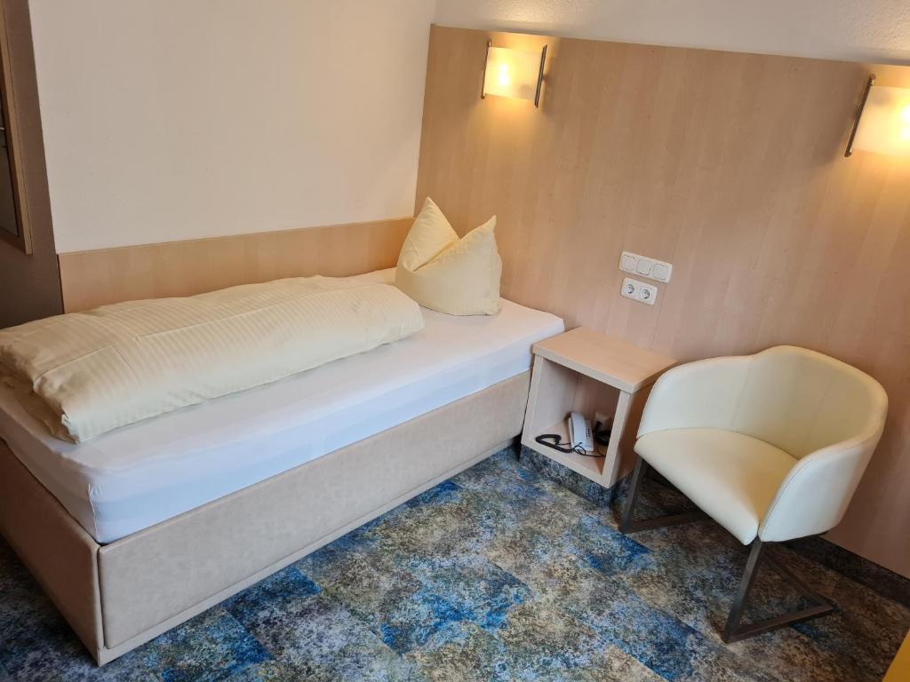 Postel nebo postele na pokoji v ubytování Hotel Stolberg