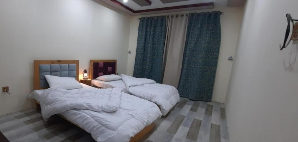 Mount View Hotel Skardu客房内的一张或多张床位