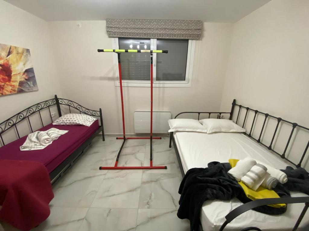 Postel nebo postele na pokoji v ubytování Maison vue sur le mer