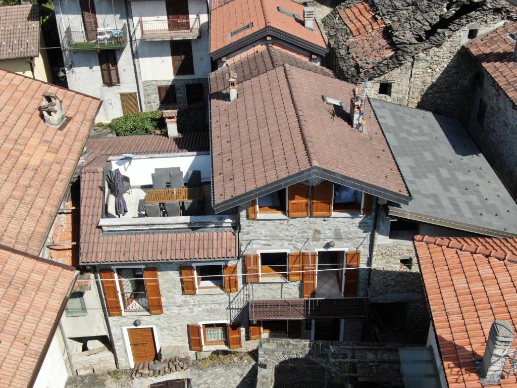 an overhead view of a house with roofs at Naturstein-Rustiko Casa Marie in Vercana