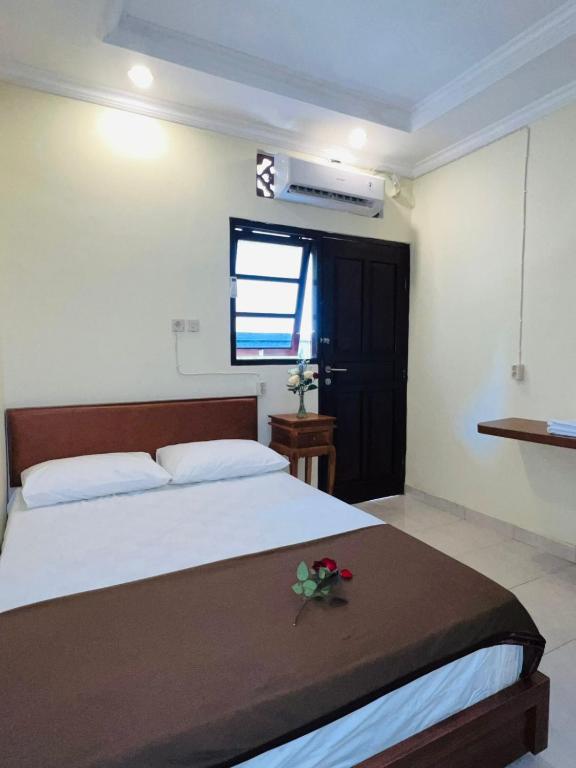 Postel nebo postele na pokoji v ubytování Zigiz Lovina Hostel