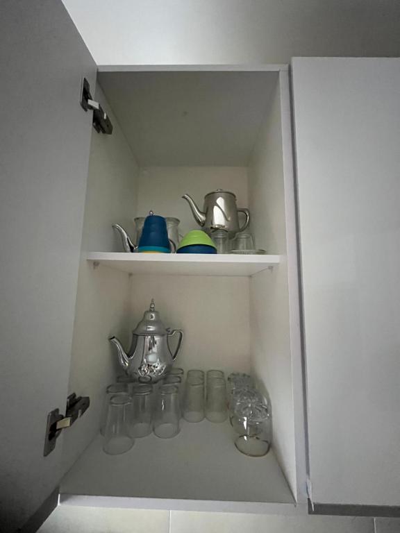 Kuchyň nebo kuchyňský kout v ubytování Résidence Colina SMIR