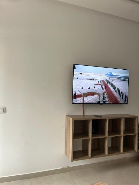TV a/nebo společenská místnost v ubytování Résidence Colina SMIR