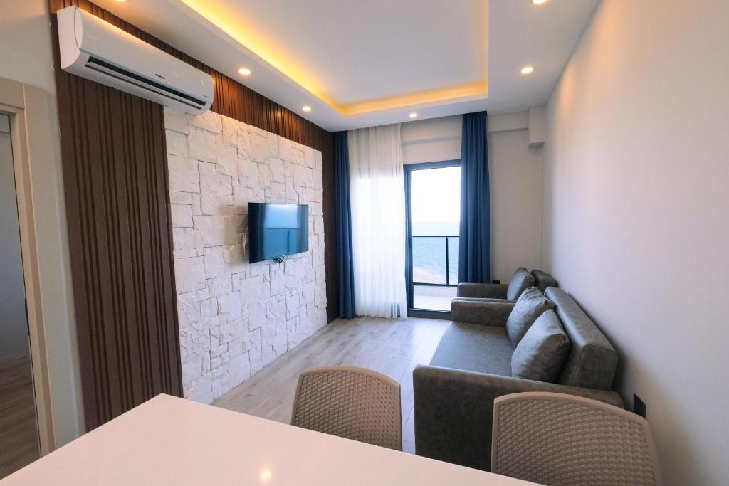 TV a/nebo společenská místnost v ubytování Class Premium Suit Otel