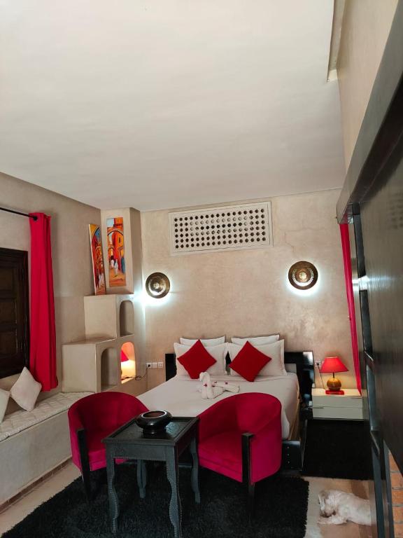 Postel nebo postele na pokoji v ubytování Riad shéhérazade Marrakech