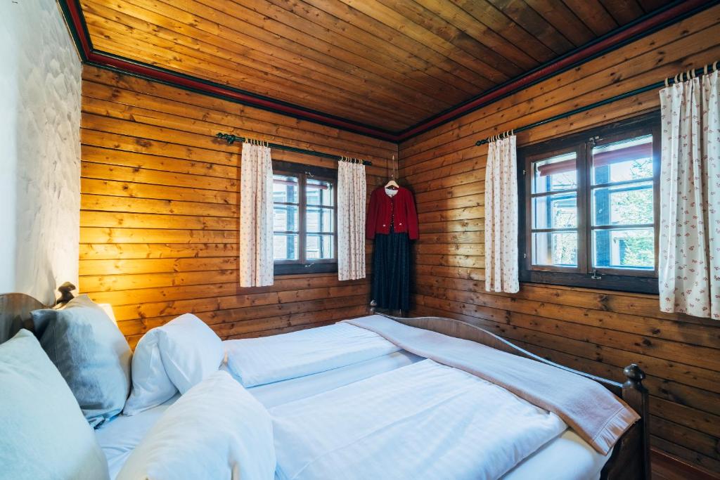 Postel nebo postele na pokoji v ubytování Slow Travel Resort Kirchleitn