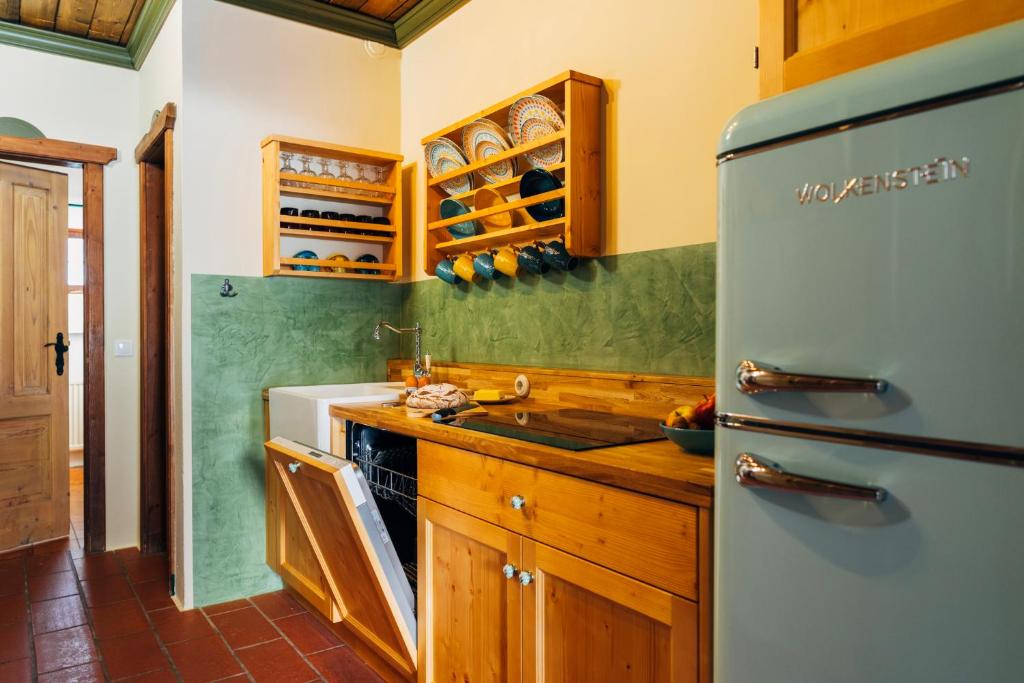 Kuchyň nebo kuchyňský kout v ubytování Slow Travel Resort Kirchleitn