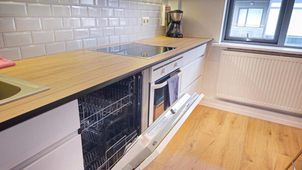 Kuchyň nebo kuchyňský kout v ubytování Reykjavik4You Apartments