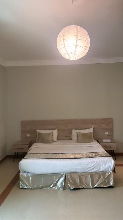 Postel nebo postele na pokoji v ubytování فندق جولدن ابها المضياف Golden Abha