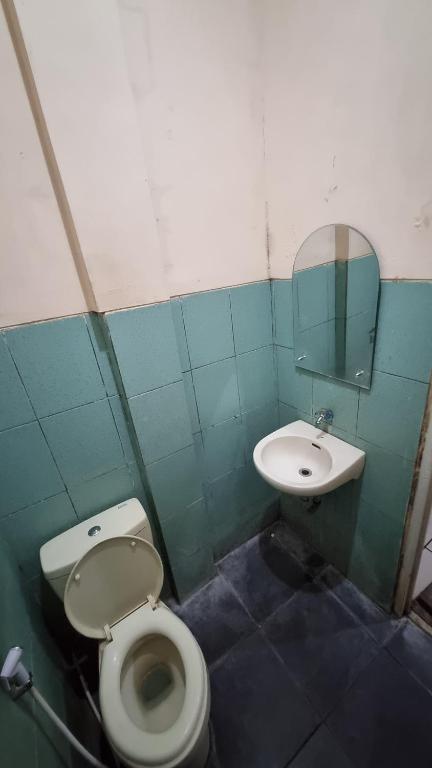 Koupelna v ubytování Wisma Alamanda