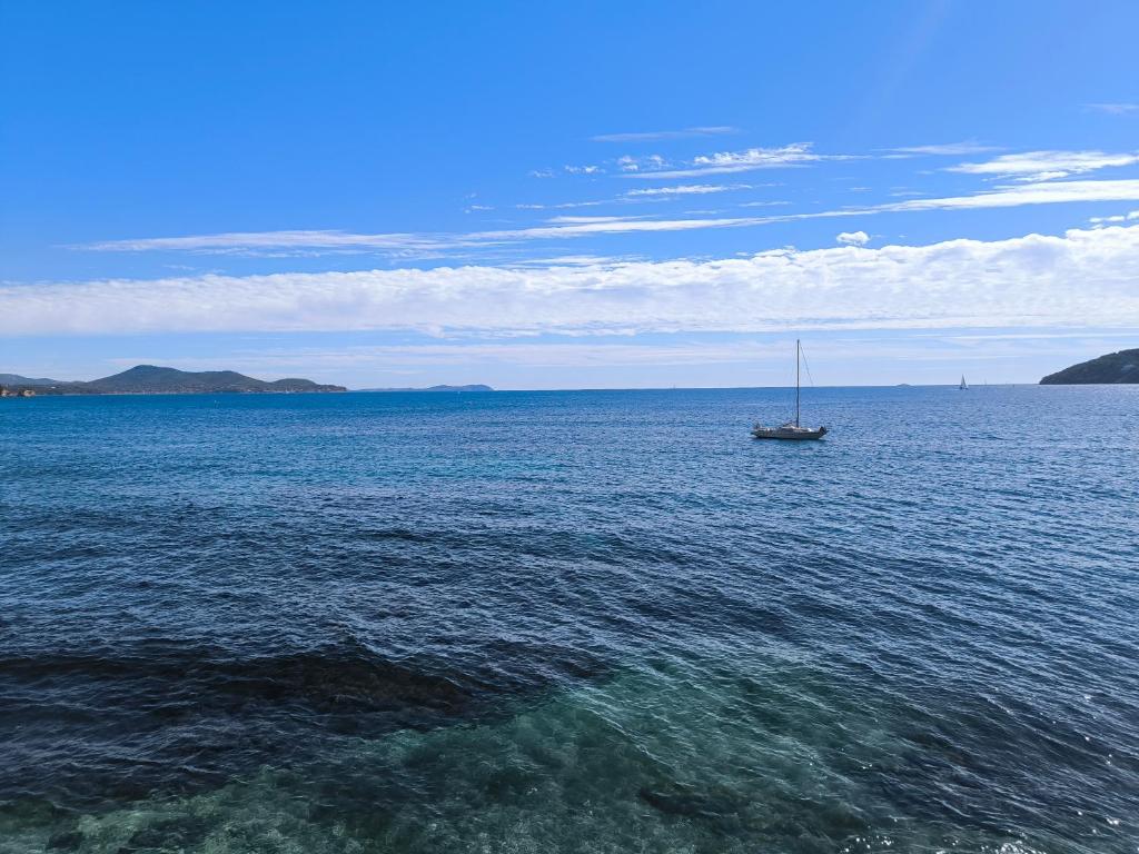 a boat in the middle of a large body of water at Les 2 Rives in Toulon