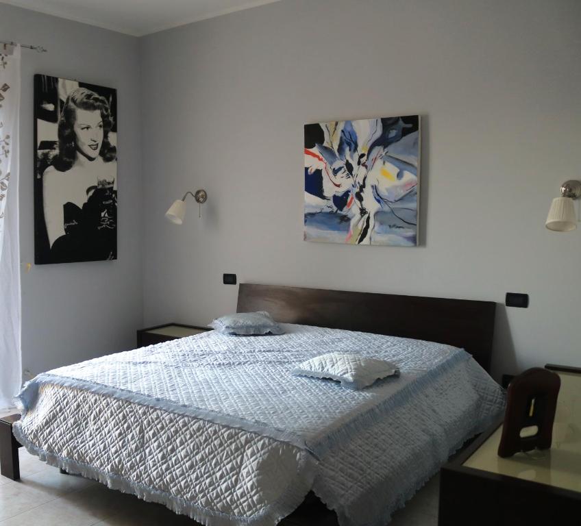 Postel nebo postele na pokoji v ubytování Albachiara B&B