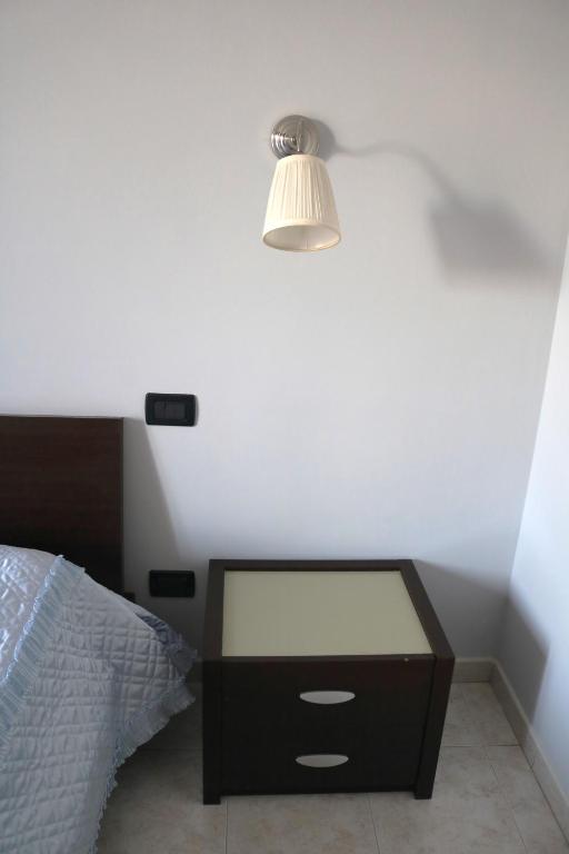 Postel nebo postele na pokoji v ubytování Albachiara B&B
