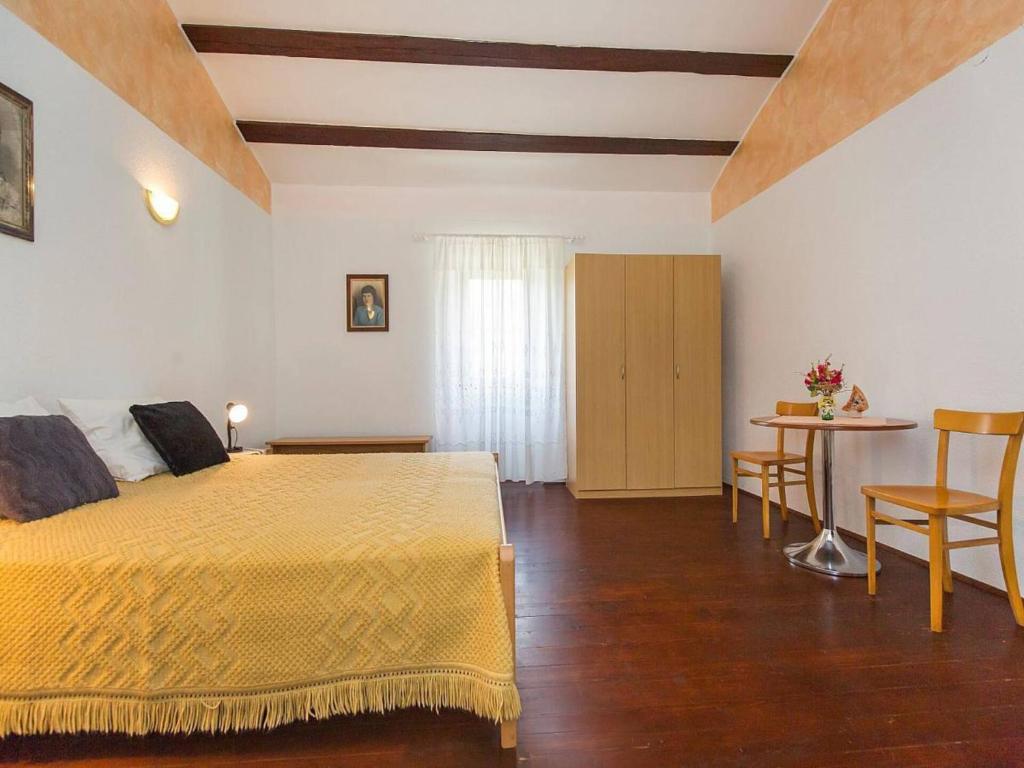 Postel nebo postele na pokoji v ubytování House Justina -Labin-quiet place