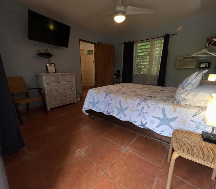 Postel nebo postele na pokoji v ubytování Isla Hermosa Guesthouse