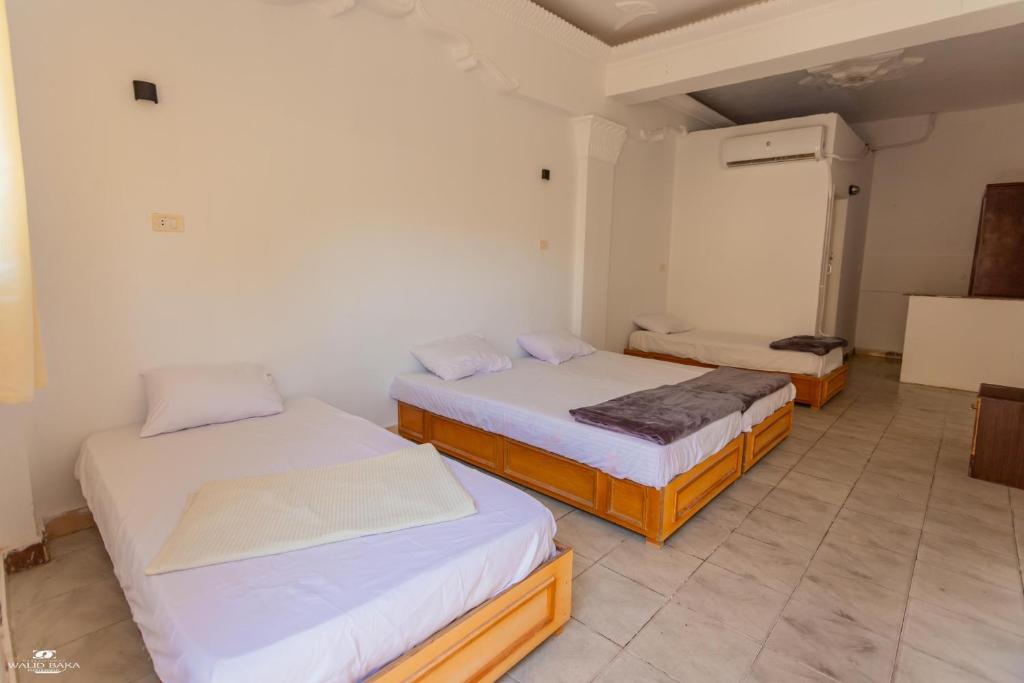 Postel nebo postele na pokoji v ubytování Home Hotel Dahab
