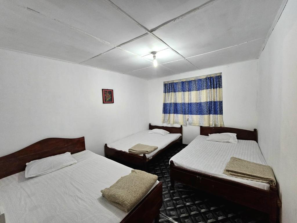 Postel nebo postele na pokoji v ubytování Haven backpackers