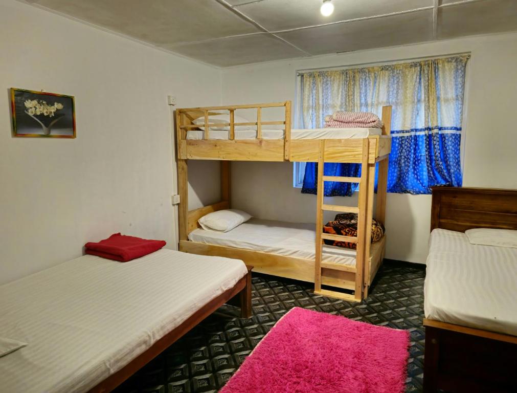 Postel nebo postele na pokoji v ubytování Haven backpackers