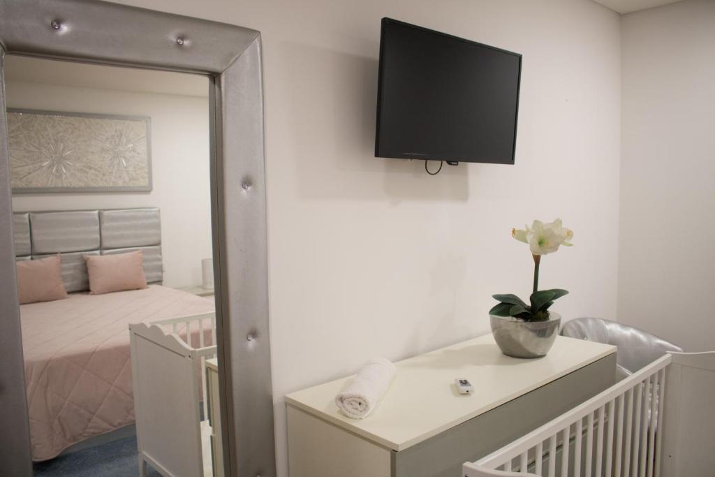 Postel nebo postele na pokoji v ubytování AM Residence