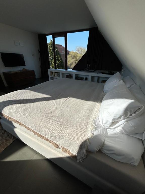 Postel nebo postele na pokoji v ubytování Boutique hotel Roosendaelhof