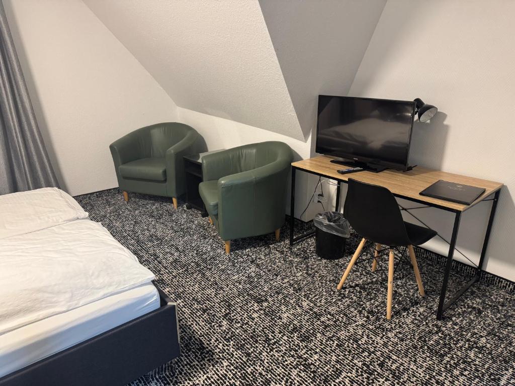 TV a/nebo společenská místnost v ubytování Panorama Hotel Rheinkrone