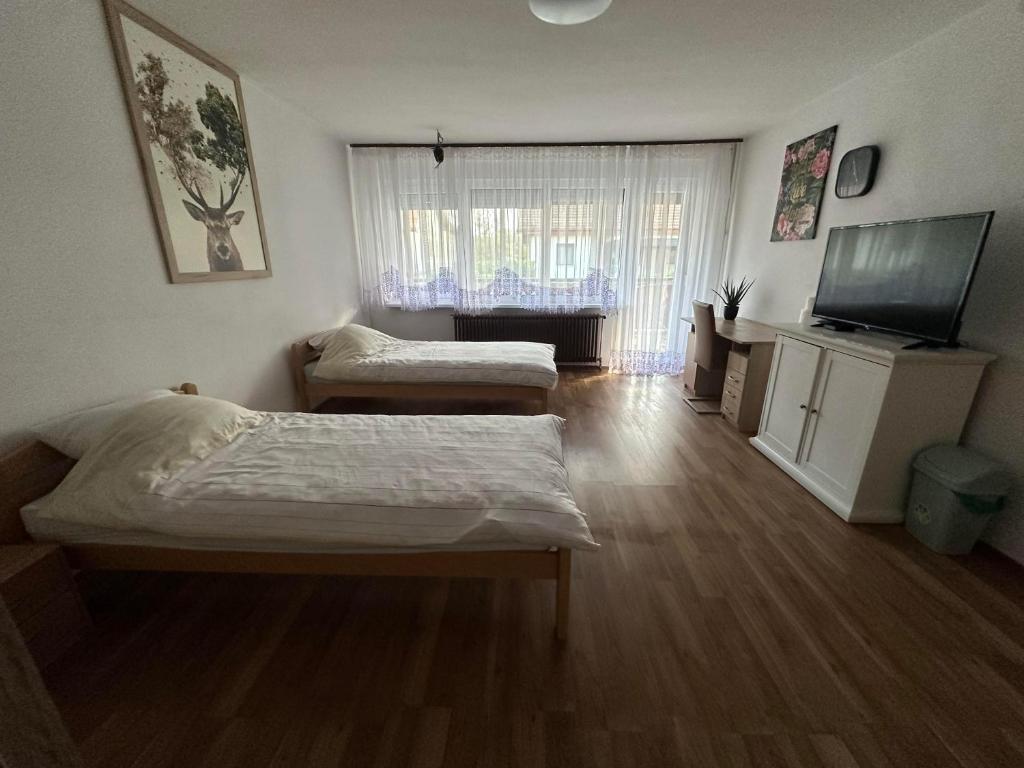 Postel nebo postele na pokoji v ubytování House Lucky
