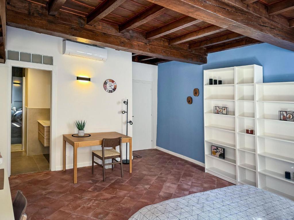 Postel nebo postele na pokoji v ubytování Residenza Gonzaga
