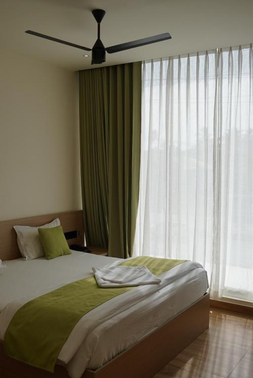 Postel nebo postele na pokoji v ubytování Dn hotel