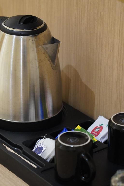 Příslušenství pro přípravu čaje a kávy v ubytování Dn hotel