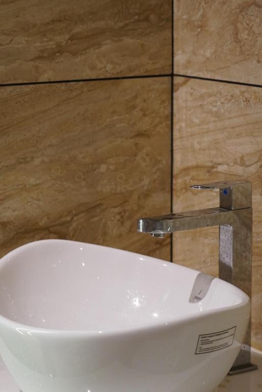 Koupelna v ubytování Dn hotel