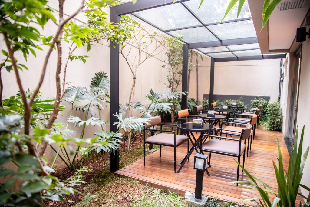 Zahrada ubytování Cozzy Suites Paraíso Hotel