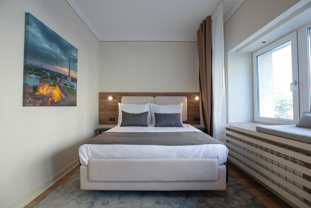 Postel nebo postele na pokoji v ubytování Simma Luxury Apartments & Rooms