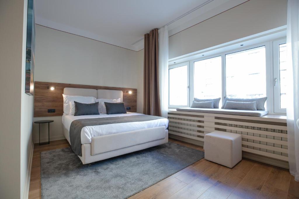 Postel nebo postele na pokoji v ubytování Simma Luxury Apartments & Rooms