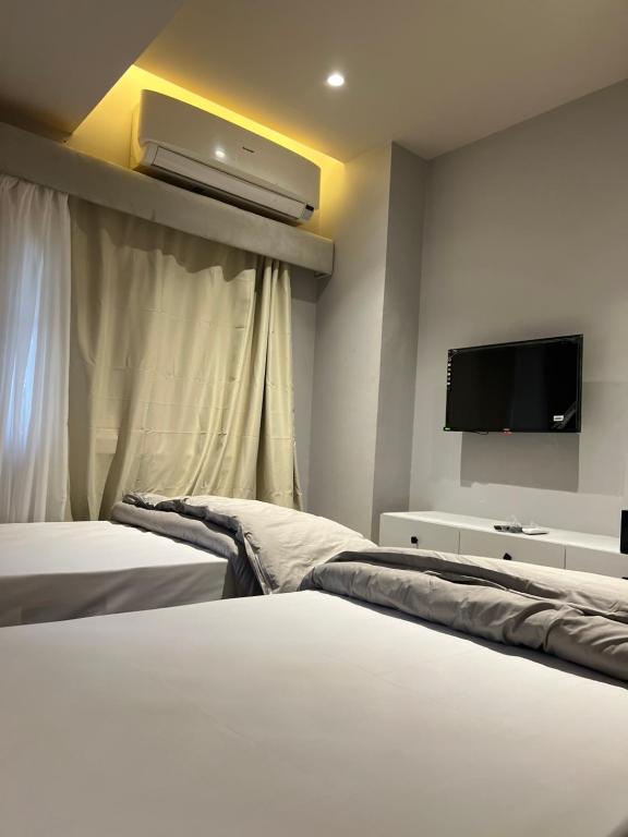 Postel nebo postele na pokoji v ubytování Pyramids NUT INN